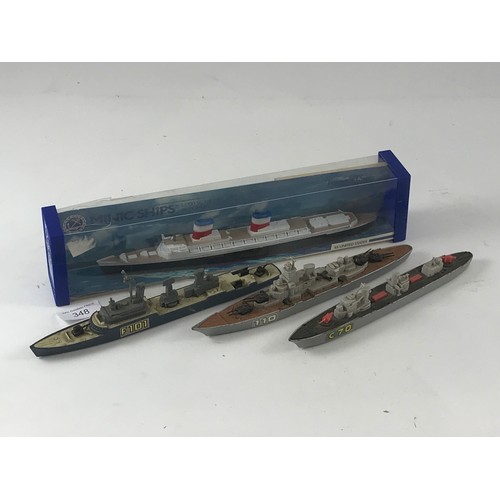 348 - TRIANG MINIC SHIPS, A BOXED SS  UNITED STATES TOGETHER WITH 3 UNBOXED MATCHBOX SHIPS, C70, 110 AND F... 