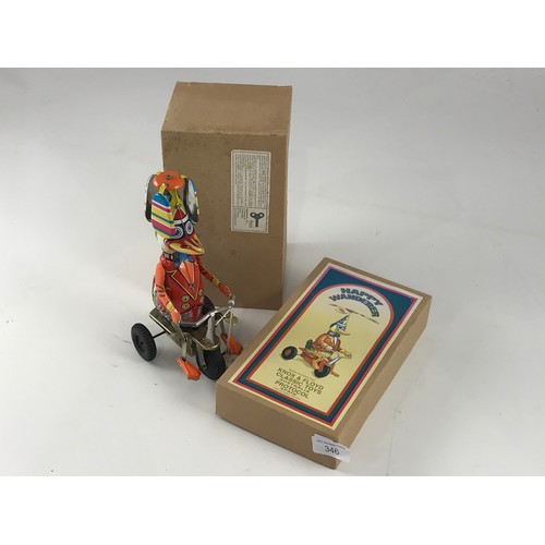 346 - HAPPY WANDERER TIN TOY