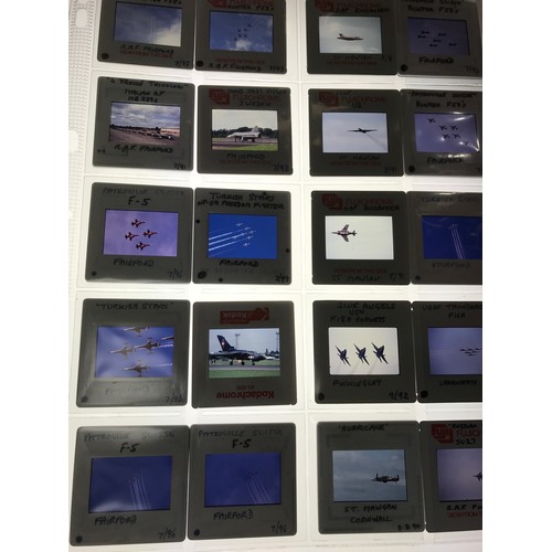 85 - 2 FOLDERS OF PHOTOGRAPHIC TRANSPARENCIES DEPICTING FIGHTER AIRCRAFT MOSTLY FROM AIR SHOWS IN THE 80S... 