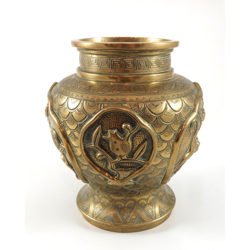 440 - ORIENTAL BRASS VASE AND COVER WITH RELIEF DECORATION AND SEAL MARK TO BASE, APPROX. 24 cm H.