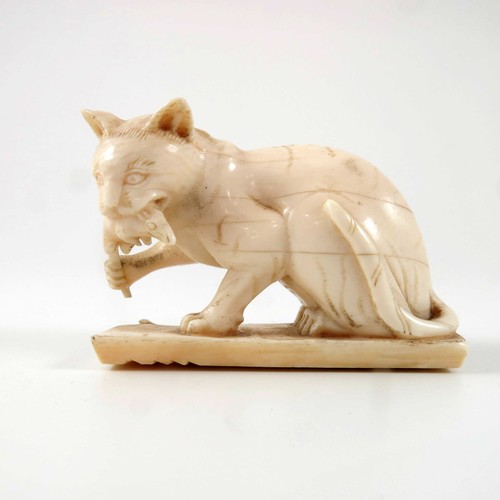 463 - 19TH CENTURY CARVED IVORY STUDY OF A CAT WITH A MOUSE