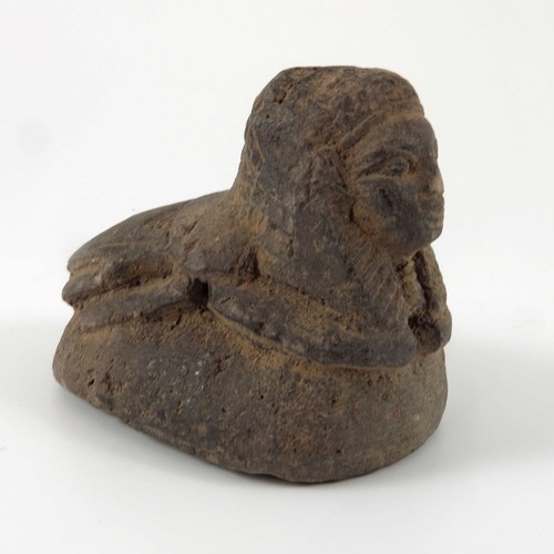 469 - AN EGYLTIAN STONE SCARAB SEAL MODELLED AS A SPHINX, APPROX. 8 cm