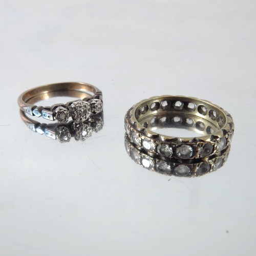 779 - 3 RINGS, 9ct GOLD RING SET WITH 3 WHITE STONES, 9ct GOLD DRESS RING AND AN ETERNITY RING