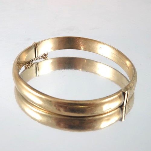 731 - 9 CARAT GOLD BANGLE 10.7 g