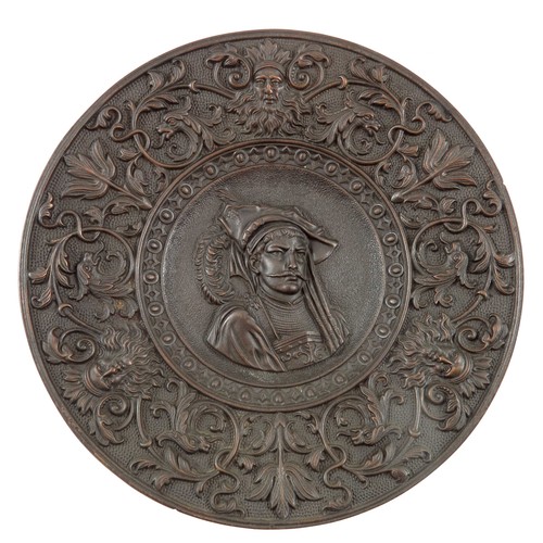 422 - HEAVY CAST METAL WALL PLAQUE WITH RELIEF DECORATION, APPROX. 31.5 cm DIA.