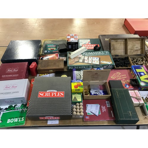 57 - VARIOUS BOARD AND CARD GAMES INCLUDING CHAD VALLEY TABLE TENNIS, MONOPOLY, BACKGAMMON, RUMMIKUB, TRI... 