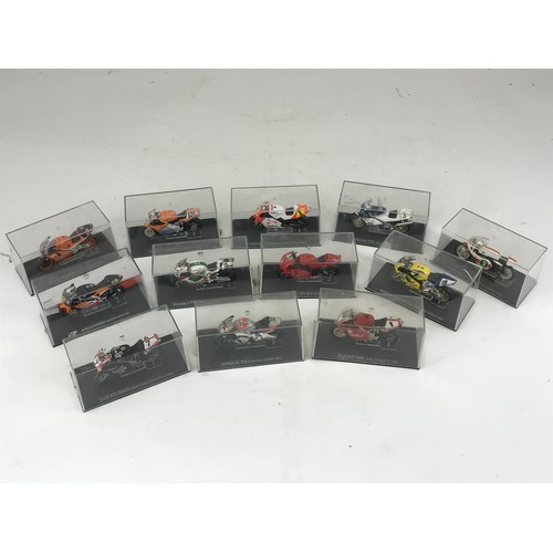 110 - 12 PLASTIC BOXED TOY WORLD COLLECTIBLES MOTORBIKES INCLUDING DUCATI 996R NEIL HODSON 2001, YAMAHA YZ... 