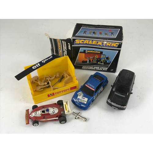 70 - BOXED SCALEXTRIC PITSTOP AND CREW INCLUDING TOOL KIT AND 3 UNBOXED CARS