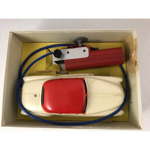 64 - MARX BATTERY OPERATED ELECTRIC CAR WITH CREAM BODY IN ORIGINAL BOX