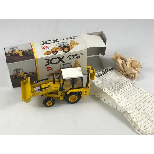 89 - BOXED JCB PROMOTIONAL MODEL, A NZG MODEL NO 277 EXCAVATOR LOADER JCB.