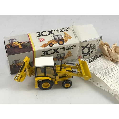 89 - BOXED JCB PROMOTIONAL MODEL, A NZG MODEL NO 277 EXCAVATOR LOADER JCB.