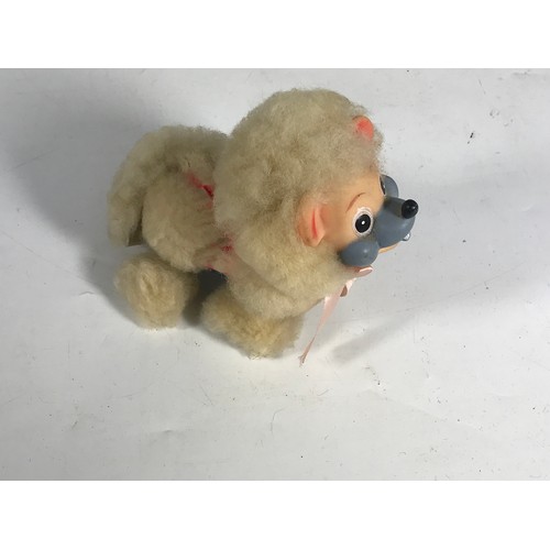 193 - A VINTAGE 20C. CLOCKWORK WIND UP POODLE TOY, APPROX. 14 CM LONG.