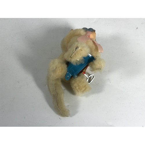 193 - A VINTAGE 20C. CLOCKWORK WIND UP POODLE TOY, APPROX. 14 CM LONG.