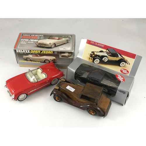 130 - BOXED MF317 OPEN SEDAN HEAVY GAUGE DIE CAST MODEL PLUS A SOLID STATE 1931 CLASSIC AND A WOODEN CAR