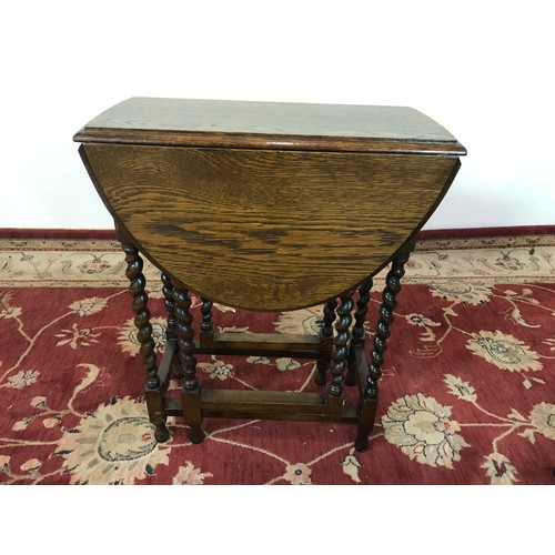 139 - OAK OCCASSIONAL TABLE WITH DRAWER & BARLEY TWIST SUPPORTS T/W AN OAK DROP LEAF OCCASSIONAL TABLE.