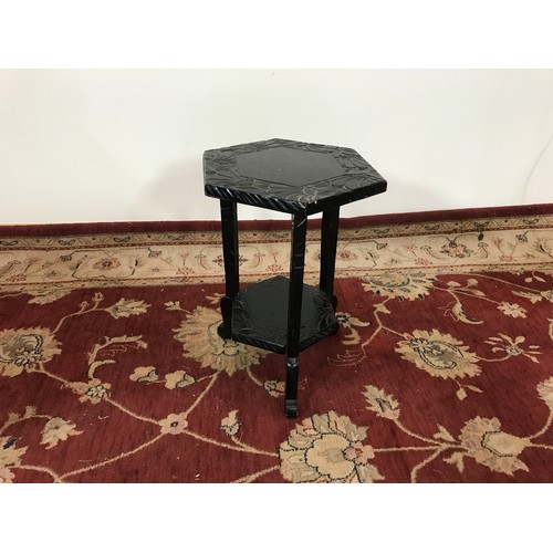 177 - CARVED OAK TABLE AND A SMALL HEXAGONAL TOPPED TABLE WITH UNDERTIER