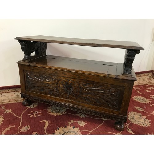 180 - OAK MONKS BENCH 107cm wide and  99cm tall