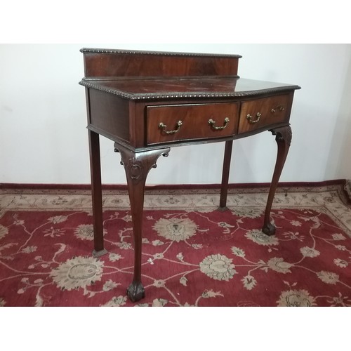 64 - REPRODUCTION MAHOGANY BOW FRONT SIDE TABLE WITH 2 FRIEZE DRAWERS ON CABRIOLE LEGS WITH BALL AND CLAW... 