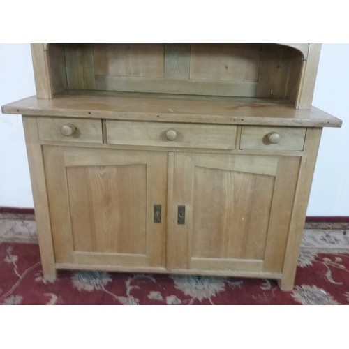 10 - LIGHT OAK DRESSER WITH GLAZED TOP 130cm wide and 196cm tall