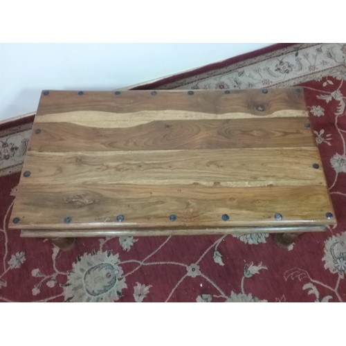 107 - INDONESIAN TYPE COFFEE TABLE 110cm long and  40cm tall