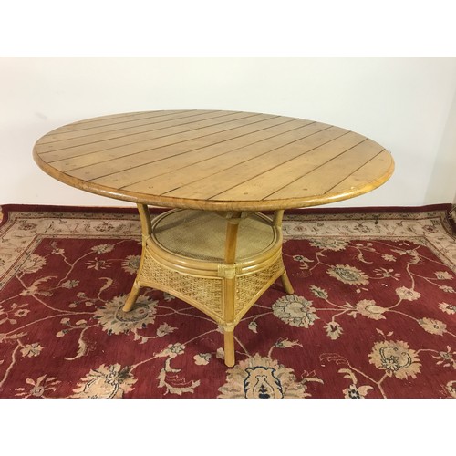 146 - TABLE WITH ROUND TOP AND CANE SUPPORT 125cm dia 75cm tall