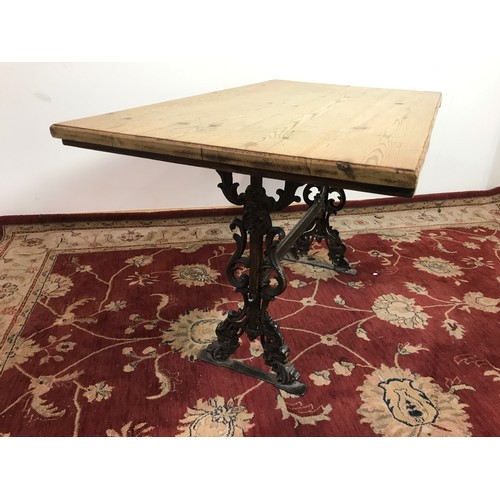 272 - HEAVY PUB TABLE WITH CAST BASE APPROX 123 CM X 70 CM