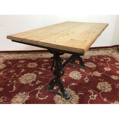 273 - HEAVY PUB TABLE WITH CAST BASE APPROX 121 CM X 70 CM