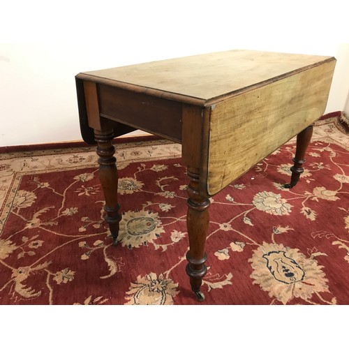 268 - DROP LEAF KITCHEN TABLE ON CASTORED FEET 106 CM X 53 CM PLUS LEAFS