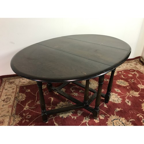 318 - ERCOL TYPE GATE LEG DINING TABLE 150cm long and  74cm tall