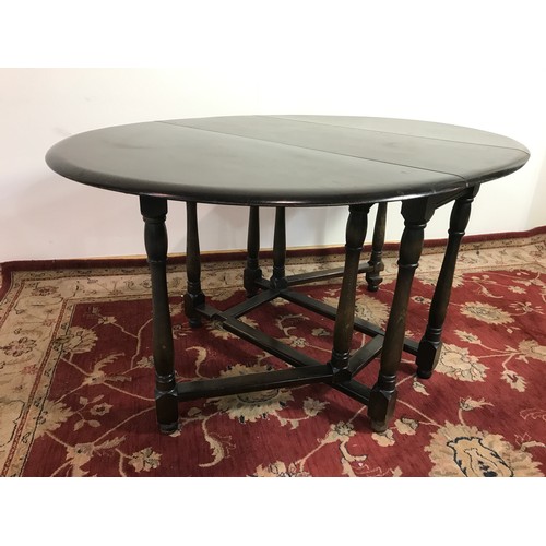 318 - ERCOL TYPE GATE LEG DINING TABLE 150cm long and  74cm tall