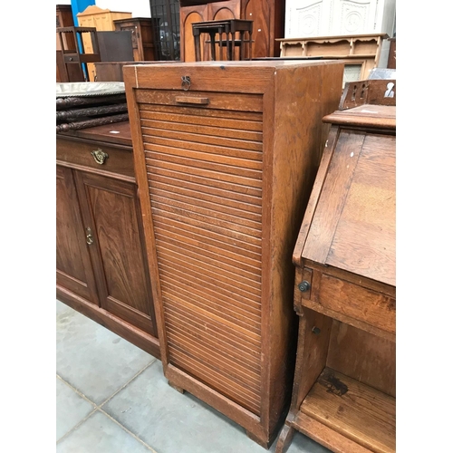 82 - EARLY 20TH CENTURY OAK TAMBOUR FRONT STATIONERY CABINET WITH SHELVES 46cm wide and 115cm tall