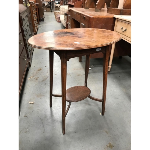 83 - OVAL TOP MAHOGANY OCCASIONAL TABLE WITH UNDERTIER 66cm wide and 71cm tall