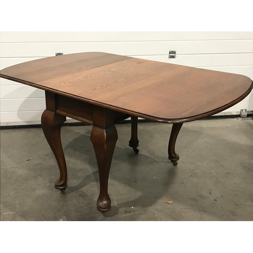 73 - GOOD QUALITY OAK GATE LEG DINING TABLE 150 cm wide and  74cm tall