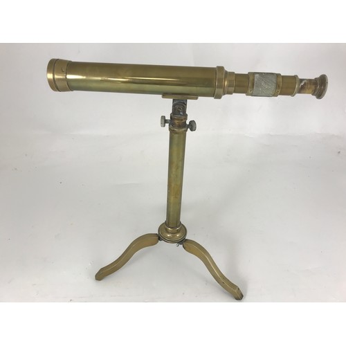 221 - BRASS TABLE TOP TELESCOPE ON FOLDING TRIPOD STAND, TELESCOPE APPROX. 36 cm