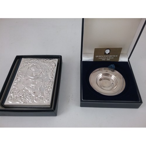 599 - SMALL HALLMARKED SILVER COMMEMORATIVE DISH IN PRESENTATION CASE AND 'THE NEW TESTAMENT' WITH DECORAT... 