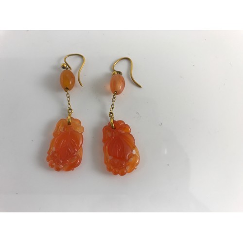 804 - PAIR OF AMBER COLOURED JADE CARVED EARRINGS