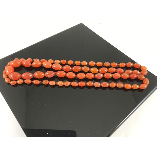 805 - NECKLACE POSSIBLY AMBER JADE BEADS