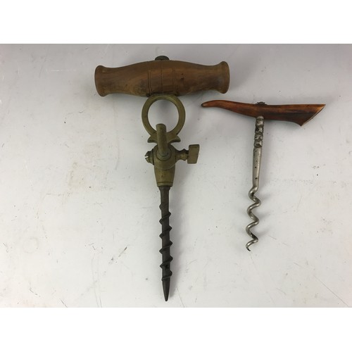 496 - WOODEN HANDLED CHAMPAGNE TAP AND 1 OTHER