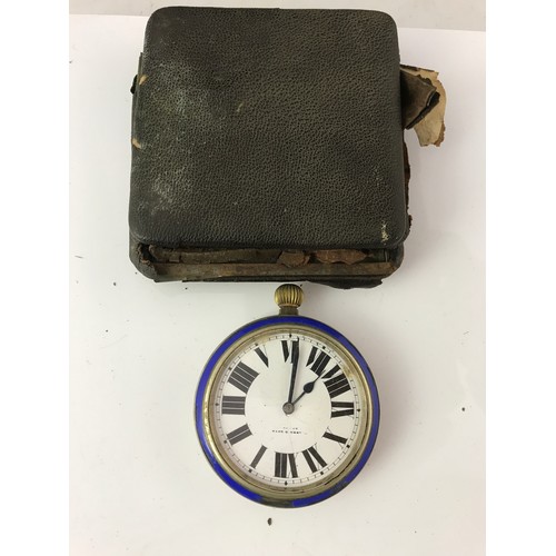 851 - LARGE GOLIATH TYPE POCKET WATCH WITH ENAMELLED DECORATION APPROX. 7 cm DIA. AND TRAVEL CASE, AF