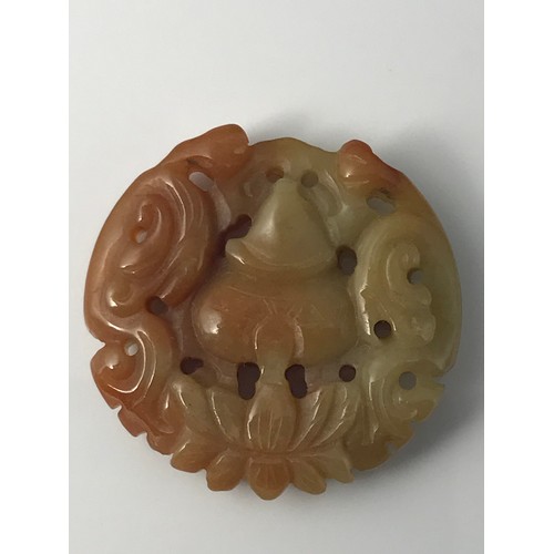 803 - ROUND PIERCED JADE CARVING/PENDENT APPROX. 4.5 cms DIAMETER