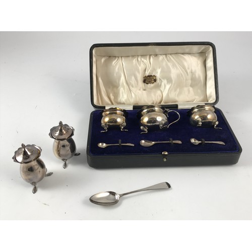 619 - CASED SILVER CRUET SET WILLIAM HUTTON, HALIFAX, 2 SILVER PEPPER POTS AND A SILVER TEA SPOON