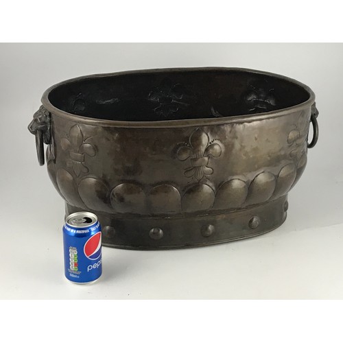 419 - IMPRESSIVE EMBOSSED BRASS WINE COOLER, 19TH CENTURY, HAVING TWIN LION MASK HANDLES, APPROX. 60 cm WI... 