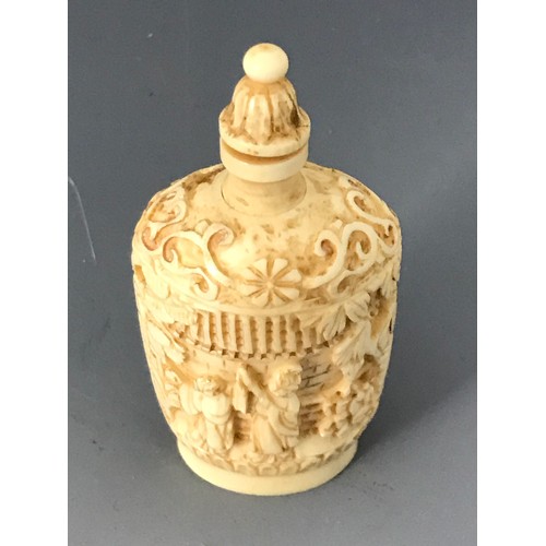 461 - INTRICATELY CARVED IVORY SNUFF BOTTLE APPROX. 6.5 cms