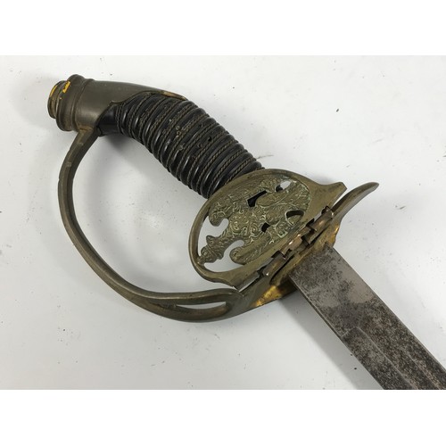 264 - IMPERIAL GERMAN OFFICER'S INFANTRY SWORD HAVING SINGLE EDGED NARROW BLADE WITH 2 FULLERS, BRASS FOLD... 