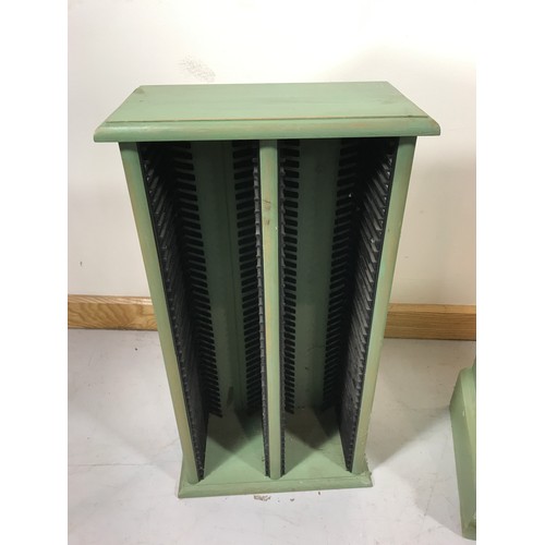 51 - GREEN PAINTED BOOK SHELVES AND A CD RACK