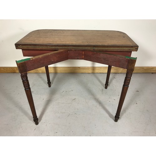 26 - GEORGIAN INLAID AND CROSS BANDED MAHOGANY FOLD OVER CARD TABLE WITH TURNED LEGS