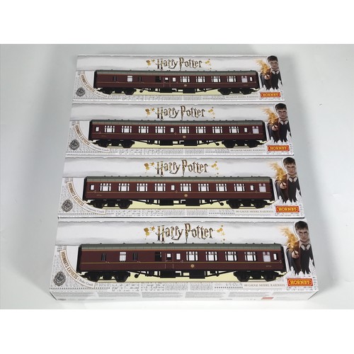 529 - HORNBY 4 BOXED HARRY POTTER COACHES, R4934A, 4935A, R4934, R4935, ALL APPEAR UNOPENED.