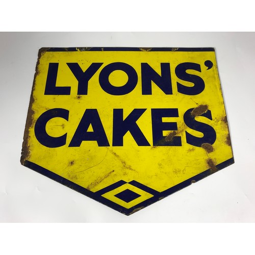 9 - ENAMEL ADVERTISING SIGN, LYONS' CAKES BEING YELLOW WITH BLUE WRITING APPROX 17.5 INCH BY MAXIMUM OF ... 