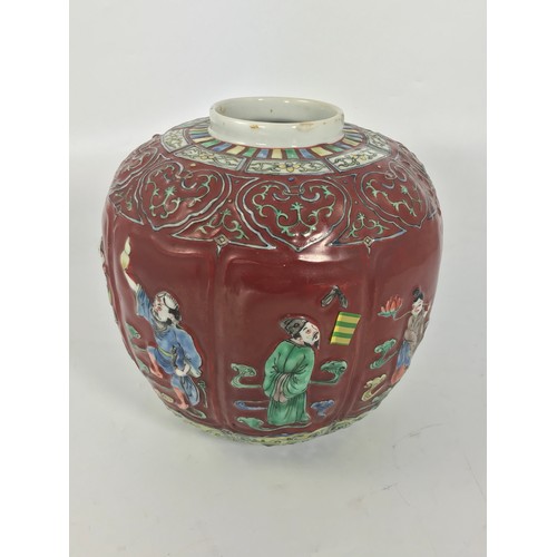 316 - ORIENTAL LOBED MELON SHAPED BURGUNDY GROUND VASE WITH RELIEF FIGURAL DECORATION AND 4 CHARACTER MARK... 