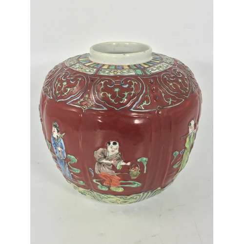 316 - ORIENTAL LOBED MELON SHAPED BURGUNDY GROUND VASE WITH RELIEF FIGURAL DECORATION AND 4 CHARACTER MARK... 